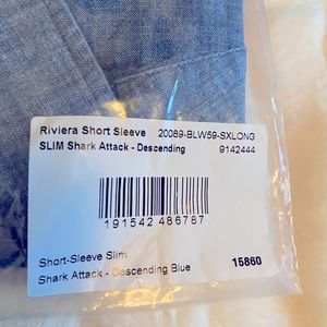 Brand new in pkg short sleeve men’s size S shirt. Chambray/tiny shark print.
